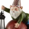 Investigating Garden Gnome Figurine with his lantern – Solar Powered