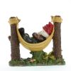 Garden Gnome Figurine Snoozing Lazily on Makeshift Hammock